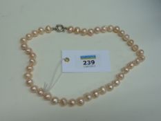 Peach pearl necklace