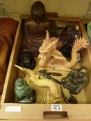 Treen and other wooden sculptures, plaster Buddha, etc in one box