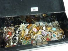 Costume jewellery in a cash box
