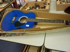 Martin Smith blue acoustic guitar