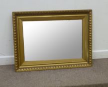 Gilt framed wall mirror, 99cm