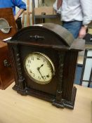Early 20th Century oak cased striking mantle clock by Gilbert