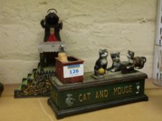 'Cat and Mouse' and 'Magician Bank' - two cast iron money boxes