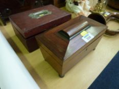 Victorian rosewood sarcophagus tea caddy and a red leather bound vanity box