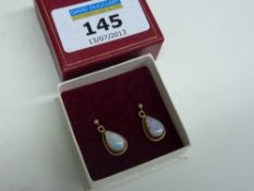 Pair of opal ear-rings in gold hallmarked 9ct