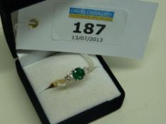 Emerald and diamond three stone ring hallmarked 182t