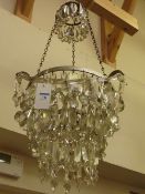 Early 20th Century centre light fitting with three tiers of prism cut crystal drops