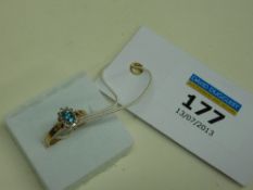Aquamarine and diamond ring with diamonds to shoulders hallmarked 9ct