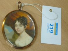 George III oval bust portrait miniature of a young woman locket with hair plaits and opaque glass