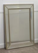Rectangular bevelled edge wall mirror in silvered double frame, 87cm x 118cm