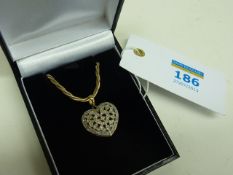 Diamond set heart shaped pendant on heavy rope twist chain stamped 375