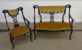 Late Victorian mahogany two seat salon settee and matching armchair, 125cm