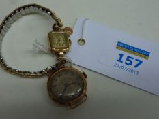 Ladies wrist watch stamped 14kt, small St Christopher charm hallmarked 9ct and a watch hallmarked