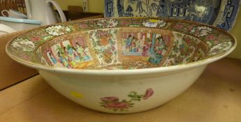 Large 19th Century Cantonese famille rose bowl decorated with figures in interior settings, 48cm