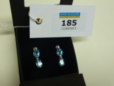 Blue topaz and diamond earrings 9ct white gold