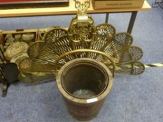 Brass 'peacock tail' folding fire screen and an oak brass bound coal bucket