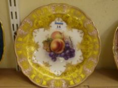 Royal Worcester cabinet plate painted with fruit, signed R Sebright with yellow and gilt border,