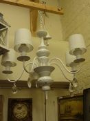 Contemporary five branch white metal chandelier