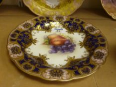 Royal Worcester cabinet plate painted with fruit, signed R Sebright with blue and gilt border,