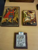 Two painted wooden icons and one other