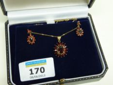 Garnet pendant and ear-rings stamped 10k