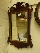 Small wall mirror in mahogany Chippendale style frame