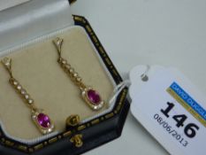 Pair of ruby drop ear-rings