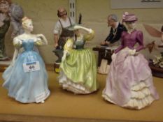 Two Royal Doulton figures 'Enchantment' HN2178 and 'Buttercup' HN2309 and a Coalport figure 'Hyde
