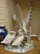 Lladro group of geese and a Lladro dove
