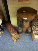 Carved wooden seat in the form of a chimp and a similar elephant CD rack