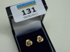 Pair of diamond knot ear studs