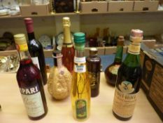 Eight various bottles mixed wines and liqueurs