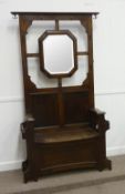 Early 20th century oak hallstand, centre mirror, hinged box seat, 110cm wide
