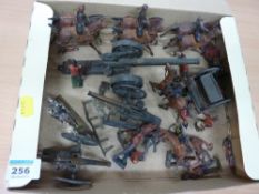 Assorted lead soldiers and field guns