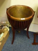 Georgian style mahogany jardiniere stand with brass liner