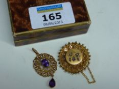 Victorian brooch stamped 9ct and an amethyst pendant stamped 9ct