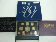 Four proof coin sets - 1970, 1971, 1999 and 2001
