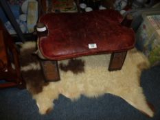 Camel stool and sheepskin rug