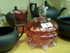 A Victorian cranberry glass powder bowl and Victorian cranberry beaker