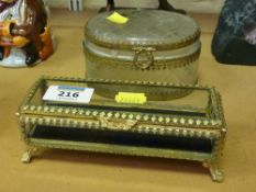 Two bevelled glass trinket boxes with gilt metal mounts