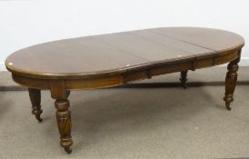 Edwardian oval oak telescopic dining table with three leaves