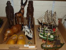 Model fishing boats, carved wooden figures, animals, etc.
