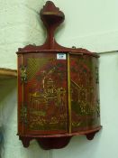 Early 20th Century red lacquered wall mounted corner cabinet with chinoiserie decoration