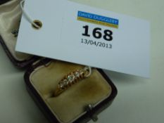 Early 20th century 18ct five stone diamond gypsy ring hallmarked