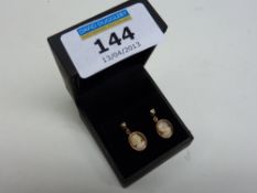 Pair of cameo ear-rings hallmarked 9ct