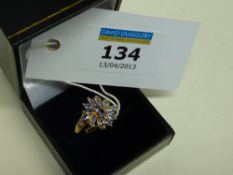 Tanzanite and diamond floral set ring