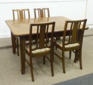 Early 20th Century oak extending dining table (181cm x 135cm) with fold out leaf and four chairs