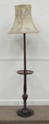 Early 20th Century mahogany standard lamp with wine table centre