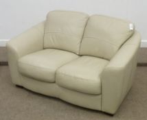 Two seat settee in cream leather, 150cm