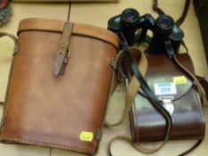 Pair of Karl Zeiss Jenopten 8x30 binoculars, serial no.5143816 cased and another leather binocular